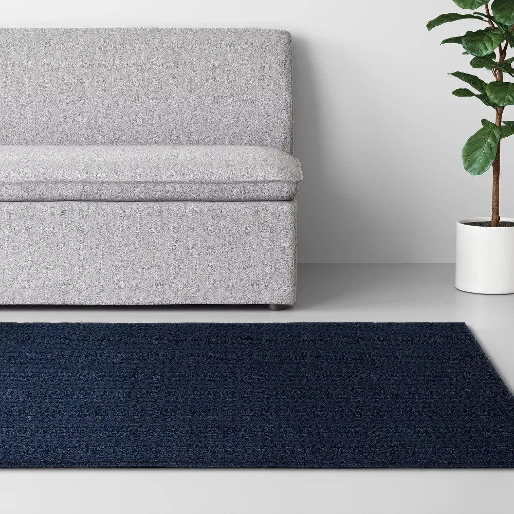 4'x5'6" Washable Solid Machine Tufted Accent Rug Blue gallery