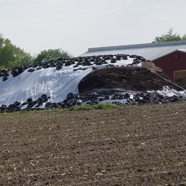 Farm Plastic Supply - 6 mil String Reinforced Black/White Silage Cover gallery