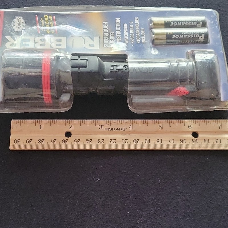 Rubber Waterproof Flashlight, 2 AA Batteries Included gallery