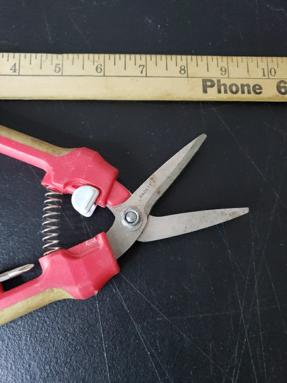 Fiskars Brand Garden Pruner With Red and Tan Handles. gallery