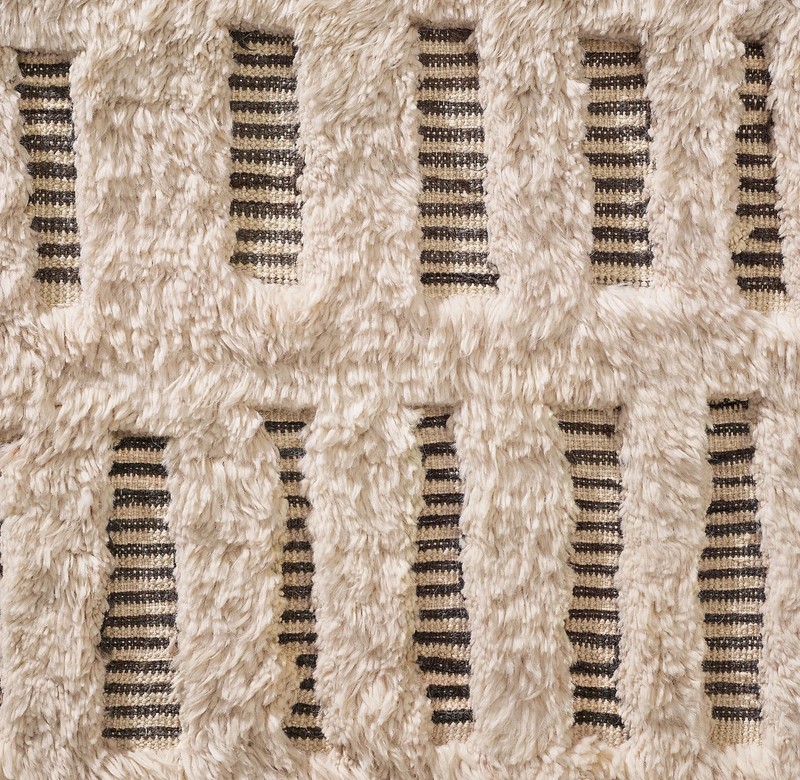 Dashed lines appear hewn into Allali's plush pile, the meditative grid of free gallery
