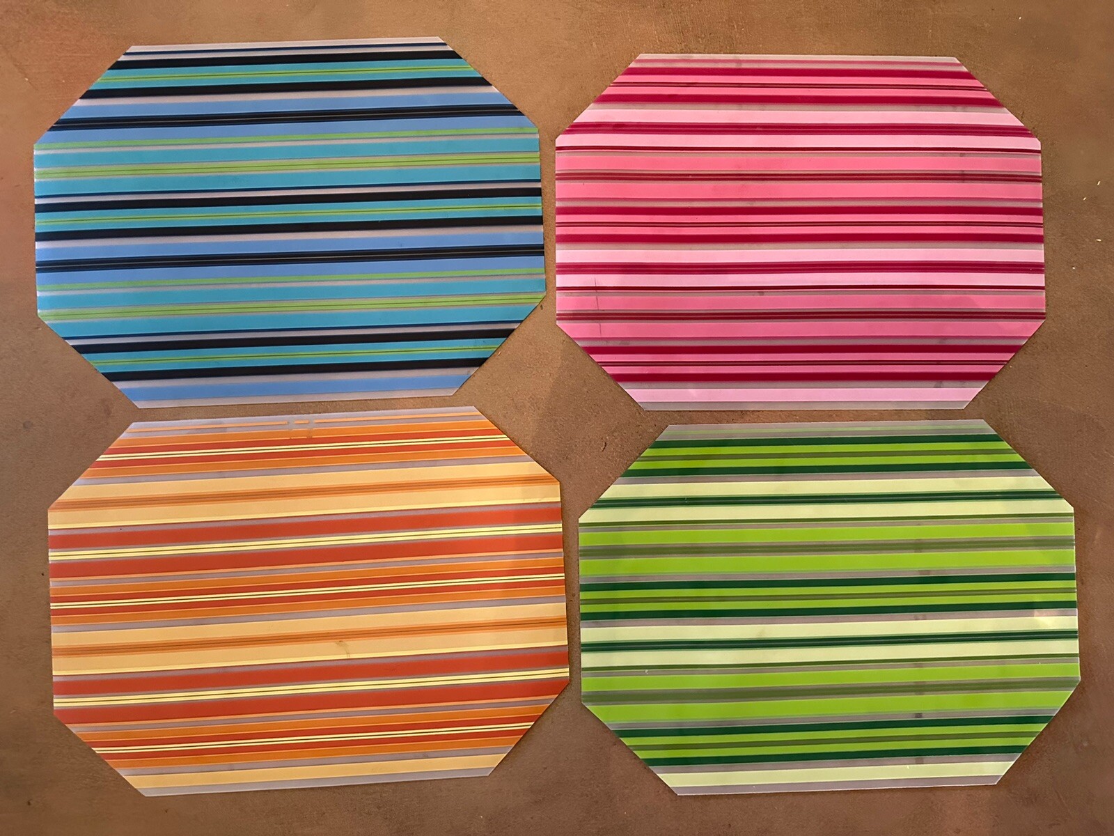 Vtg Octagonal Striped Placemat Flexible Plastic Green Pink Blue Orange Set 4 gallery