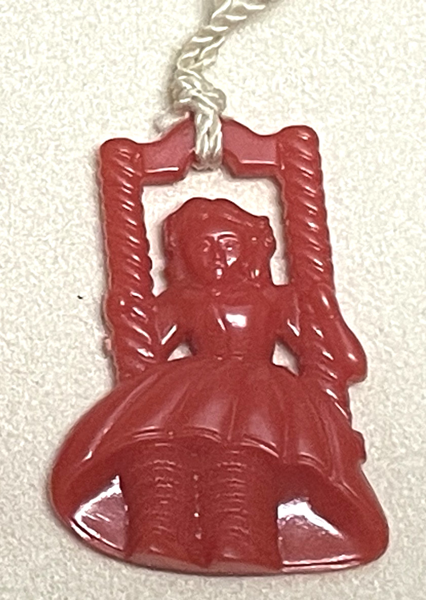 WINDOW SHADE or LIGHT CHAIN PULL, Dutch Girl on Swing Vintage 1950s Red Plastic gallery