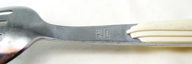 Unknown Maker Stainless Steel & Plastic JAZZ CREAM Pierced Table Serving Spoon gallery