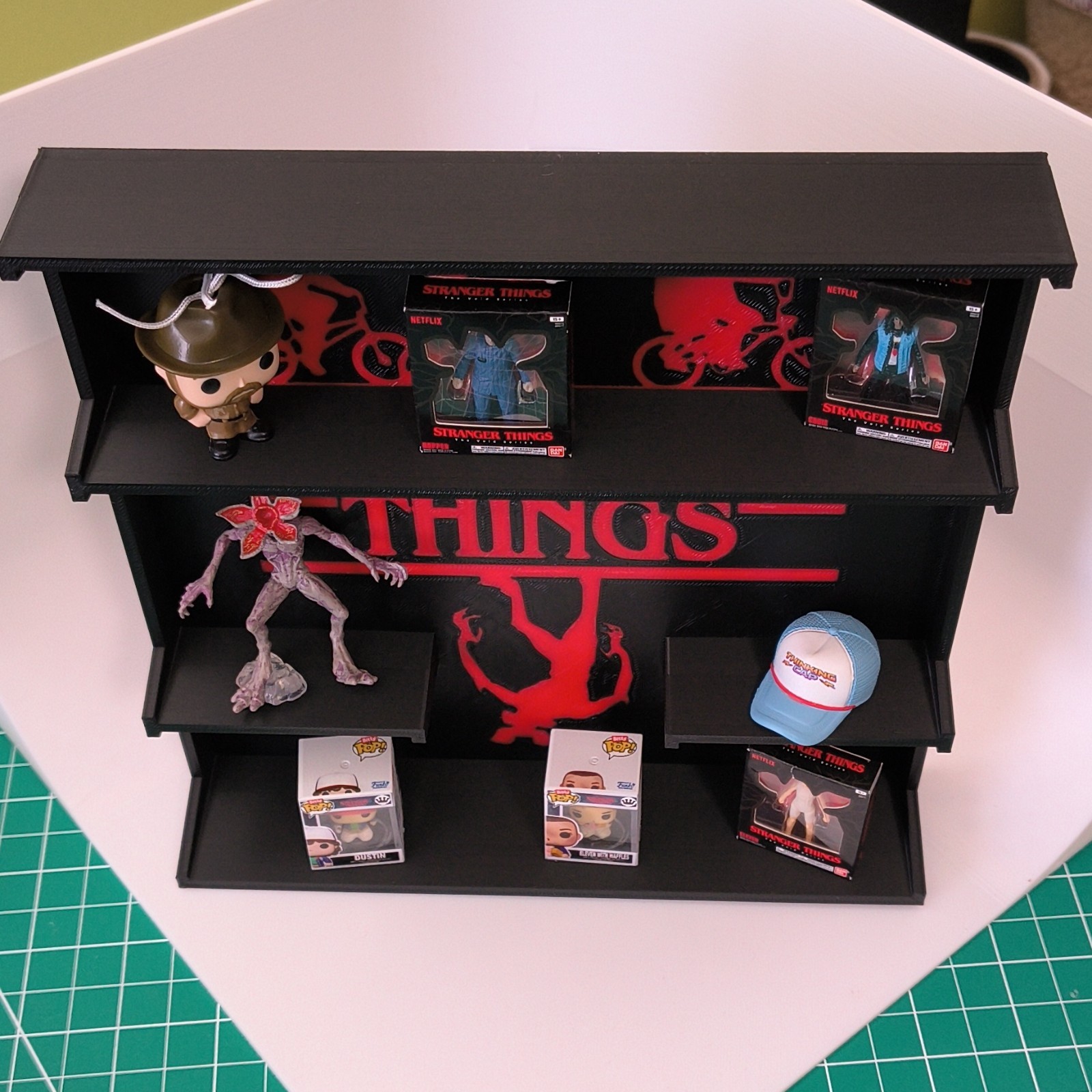 Stranger Things assorted lot with display shelf gallery