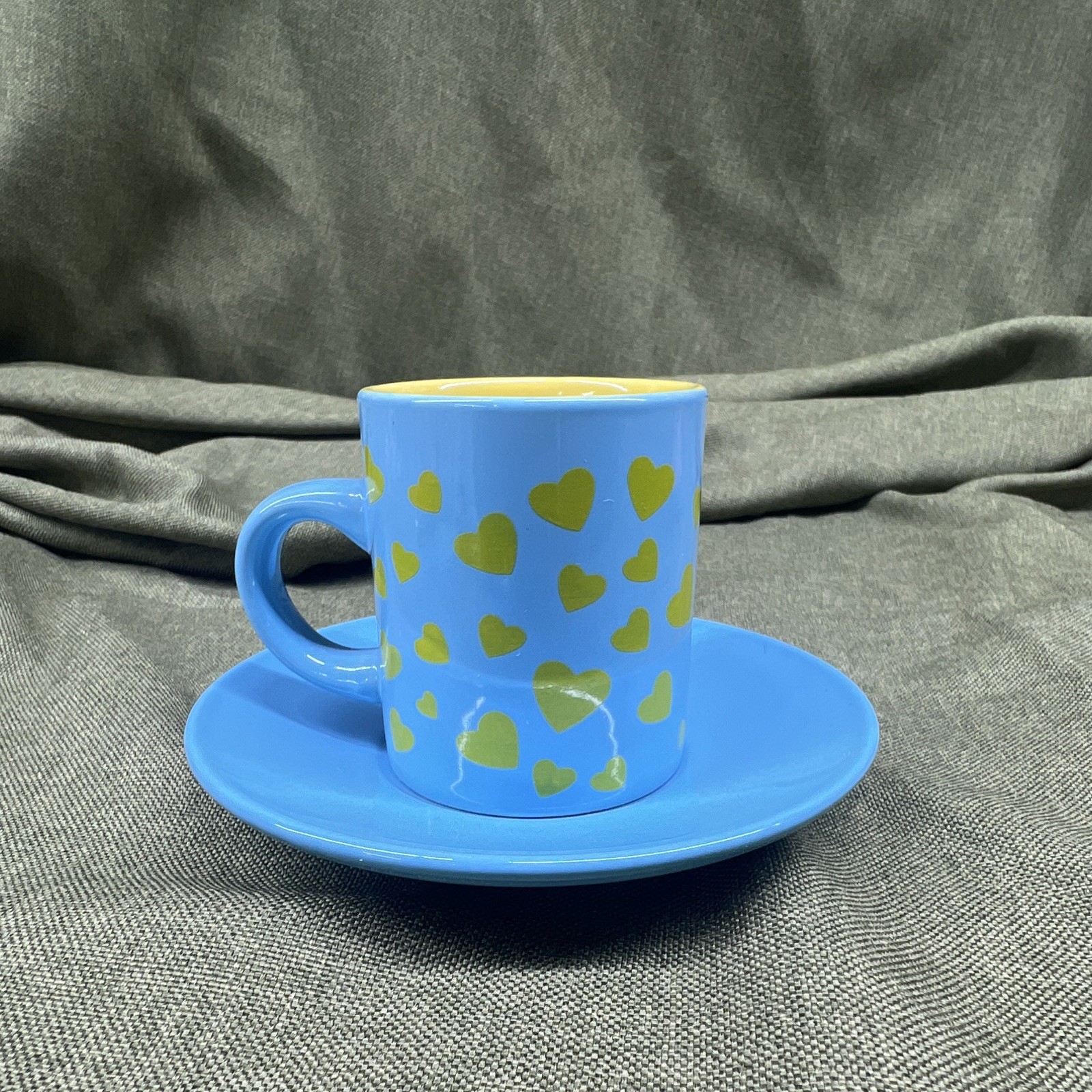Blue/Yellow/Green Ceramic Tea Cup & Saucer 2-Piece Set, Decorated Hearts Face gallery