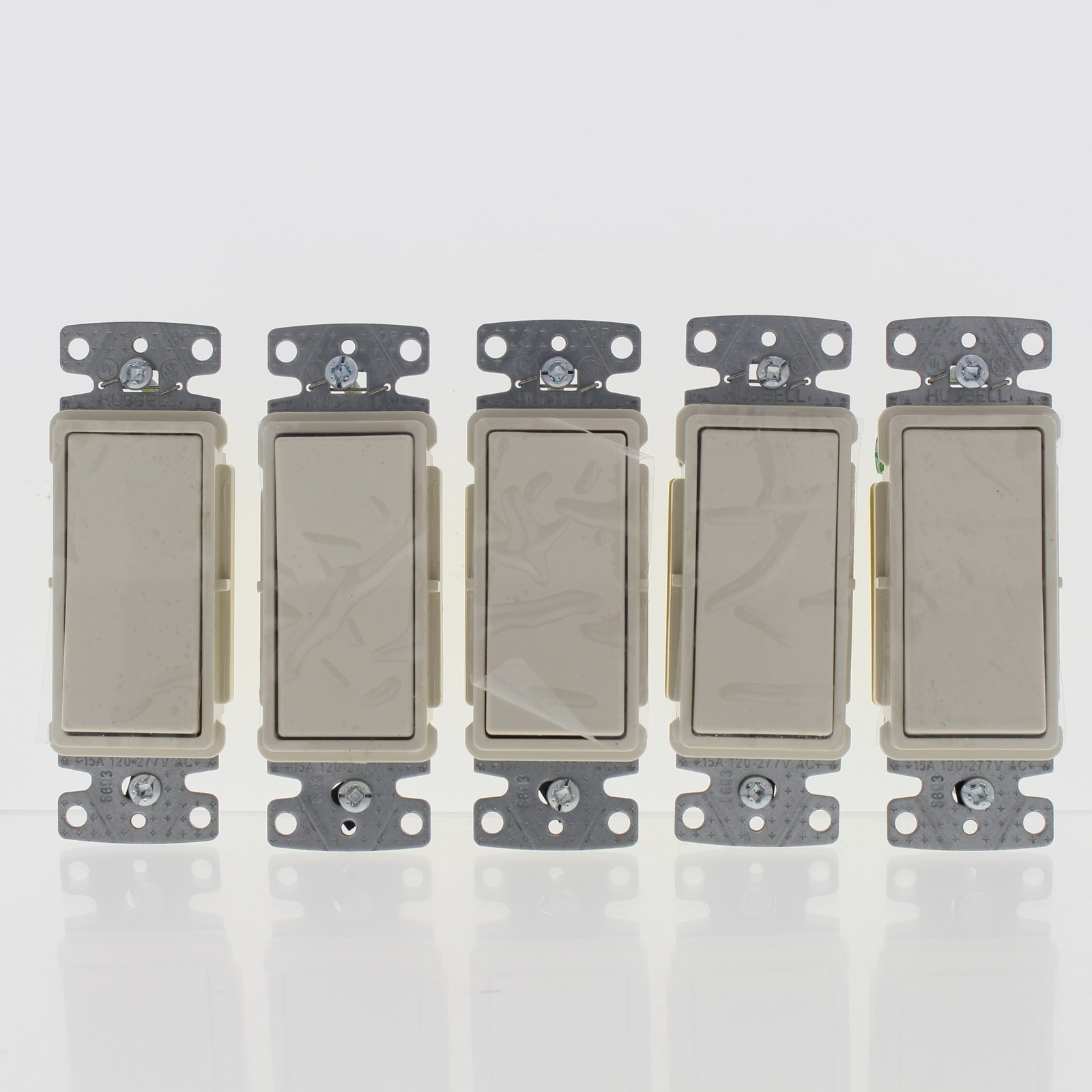 Hubbell Light Almond Decorator Rocker Wall Light Switches Single Pole 15A 5-Pack gallery
