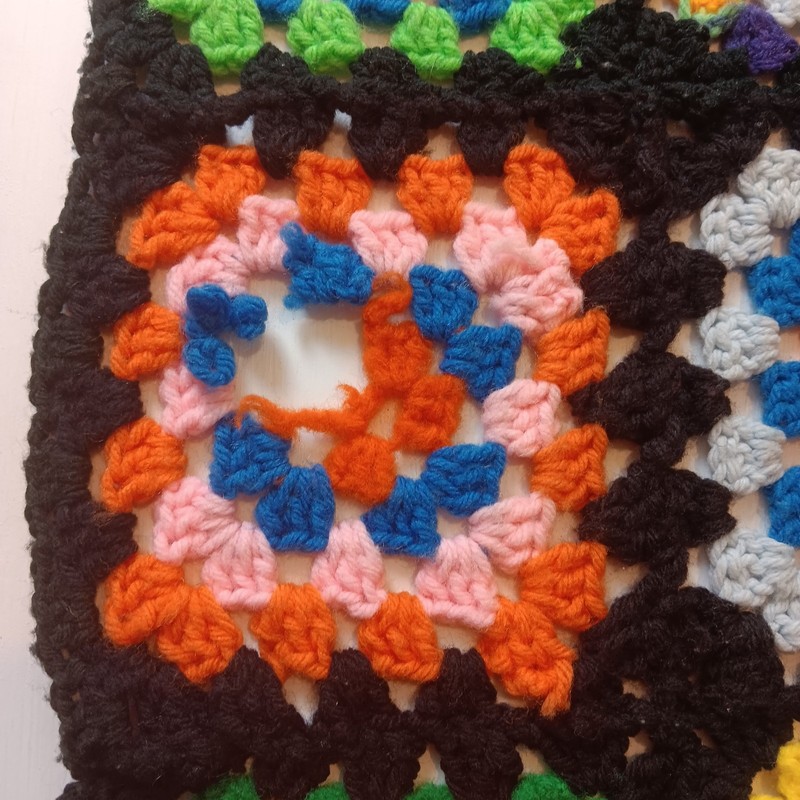 VTG Handmade Granny Square Afghan Blanket Crochet 47x62" Black Red Pink Blue gallery