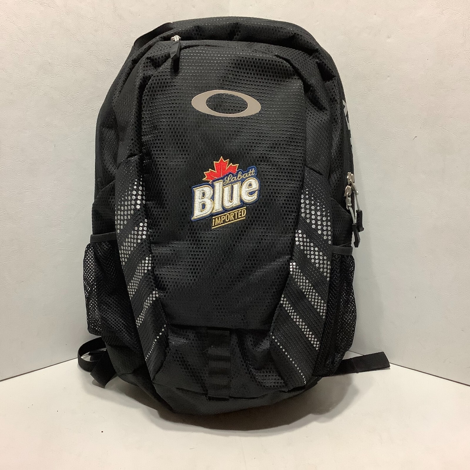 Oakley #92604 Backpack Black Labatt Blue Imported Embordered Front 18" x 12"