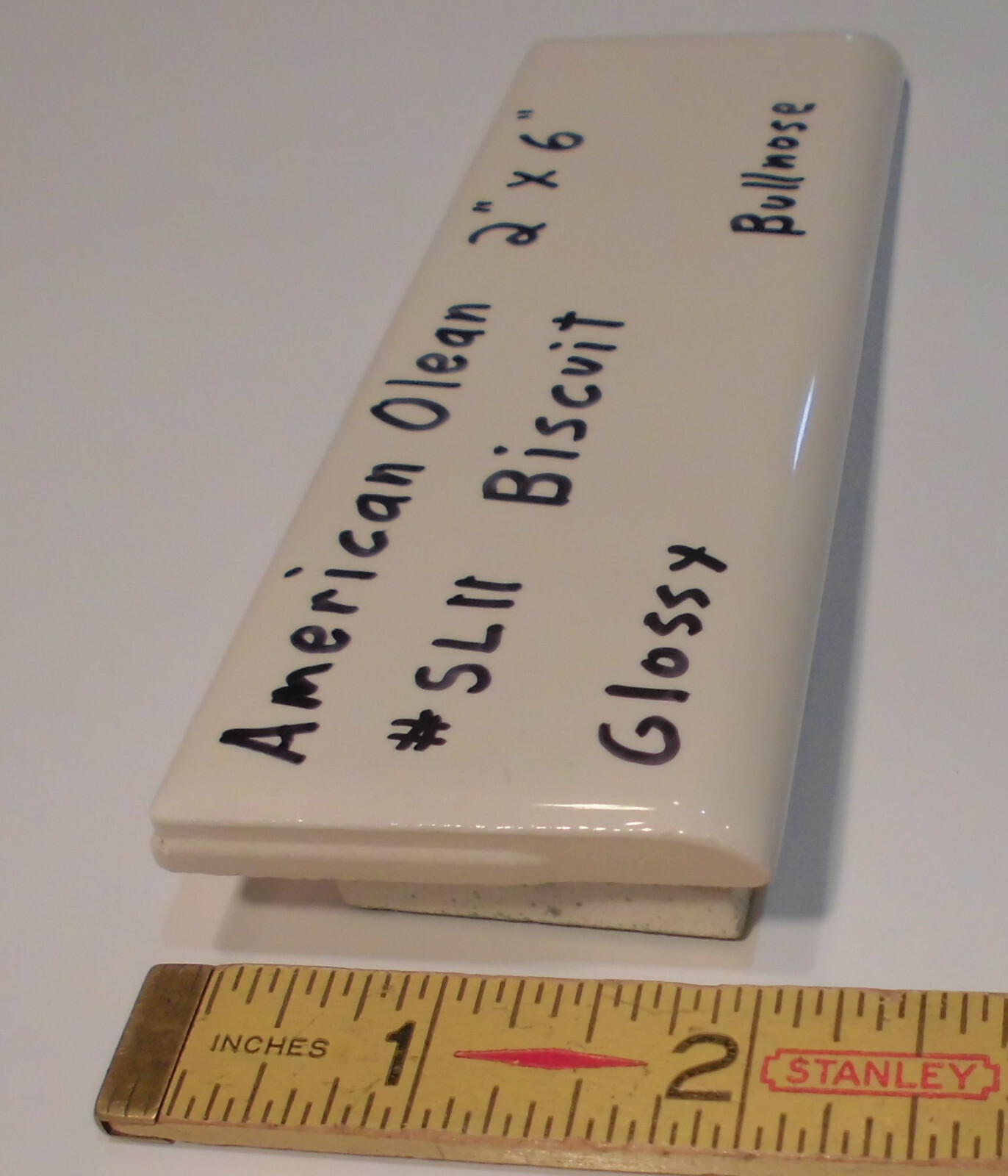 1 pc. Starting Line by American Olean; #SL11 Gloss Biscuit Bullnose Ceramic Tile gallery