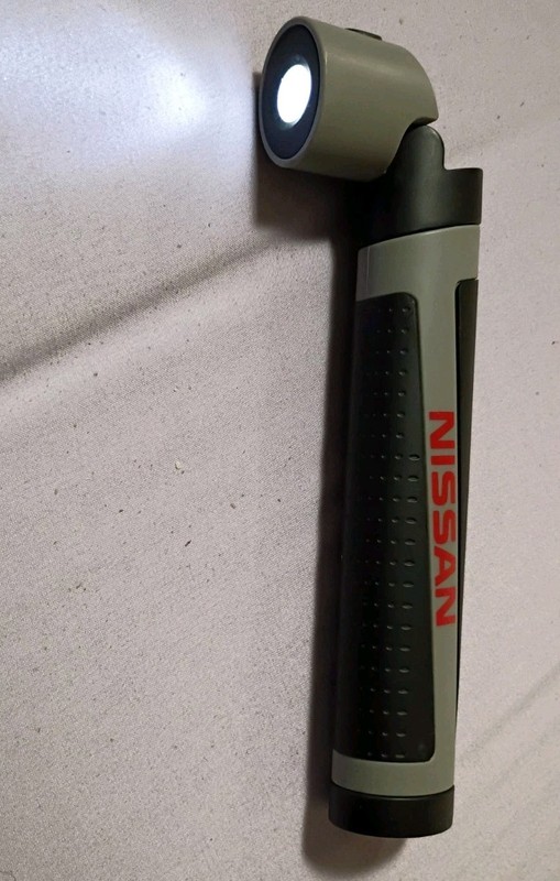 Nissan Extendable Work Light. Magnetic Base. USED. Requires 3 AAA batteries. gallery
