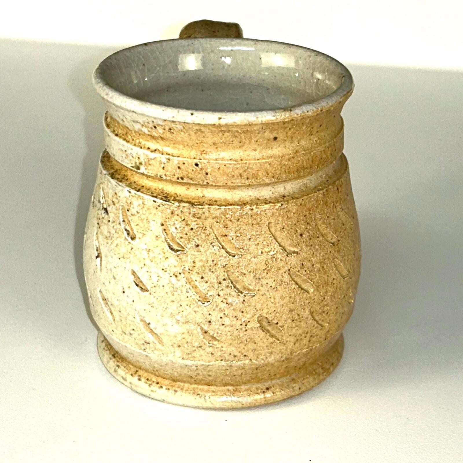 Rustic handmade studio pottery mug - etched tan and gray speckled glaze gallery