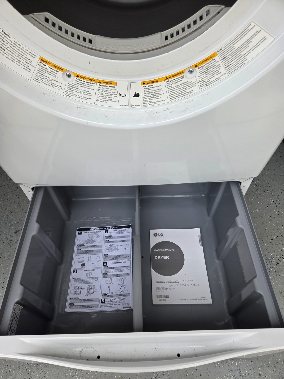 Used LG white front loading gas dryer in very good condition includes stand gallery