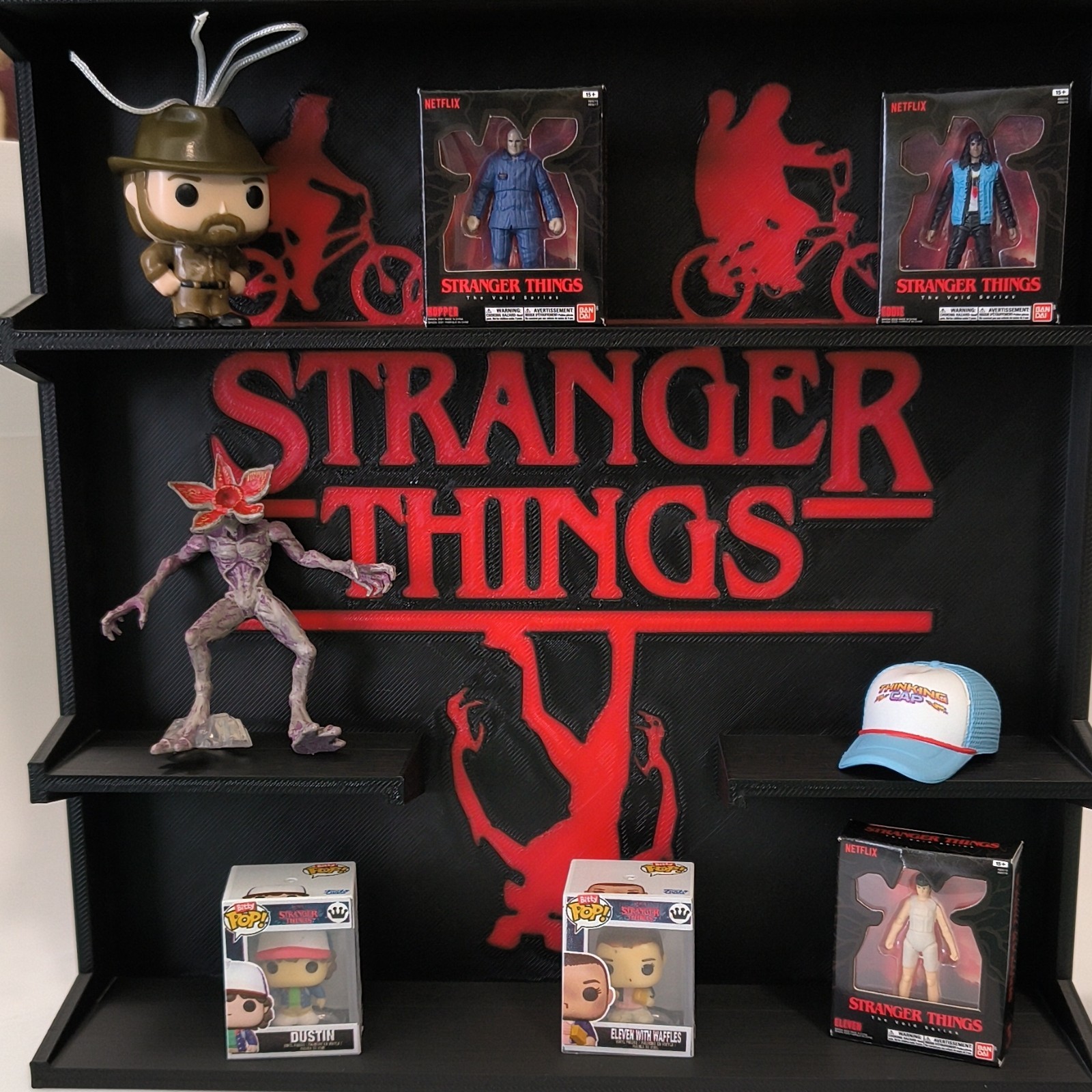 Stranger Things assorted lot with display shelf gallery