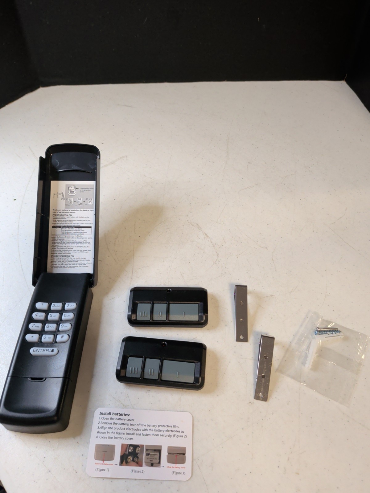 877MAX Garage Door Keypad And 2 Remote Control gallery